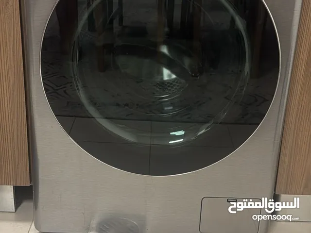 LG ThinQ Front Load Washer - Efficient and Stylish! A washing machine with 100% drying