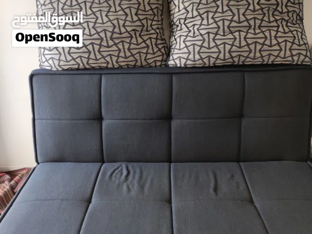 Sofabed with cushions