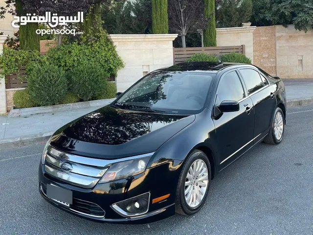 فورد فيوجن فل كامل مع فتحه وغرفه جلد تحكم طاره كراسي كهربا شاشه مع ساوند سستم منفوضه بالكامل