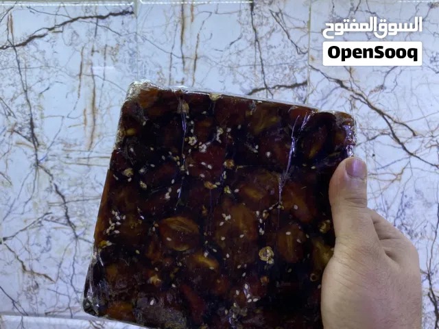 تمر بانواعه وطرشي وحلاوه نهر خوز ودبس وراشي