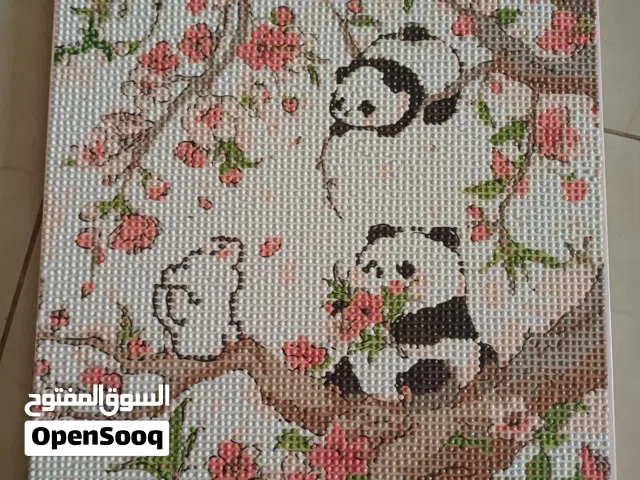 Cute panda painting with dots filled in by hand