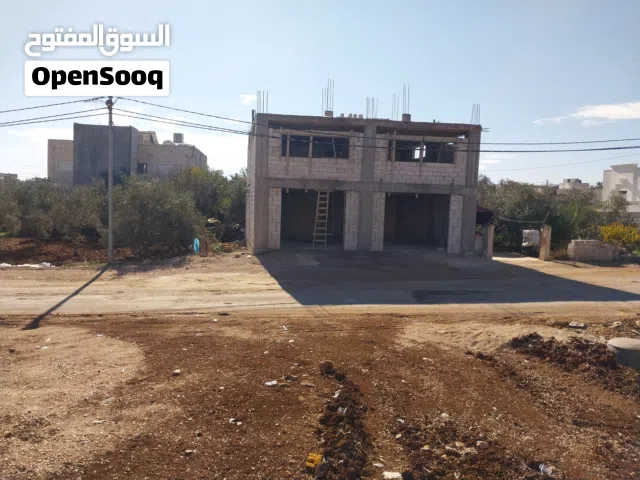 مستودع للإيجار في حوارة – إربد (طابقان)