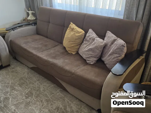 طقم كنب صوفيات مع مساحة تخزينية لجميع المقاعد
