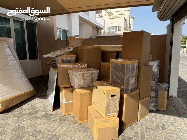 AUS Movers & Packers Door to Door Home Moving services Local & International