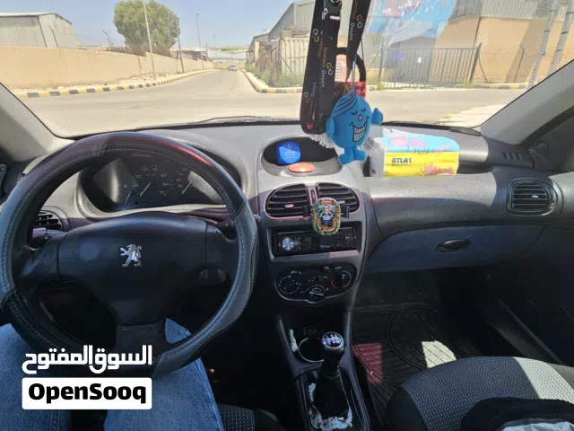 2003 بيجو 206 Base