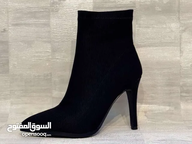 Black With Heels in Amman