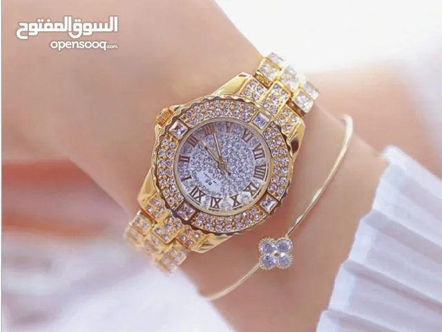 الساعة الاصلية من ماركة Bee Sister بمحرك ياباني ولون لا يتغير وبكرت الضمان وكيس وعلبة الماركة