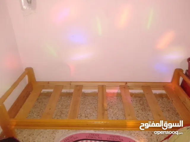 سرير خشب لنوم