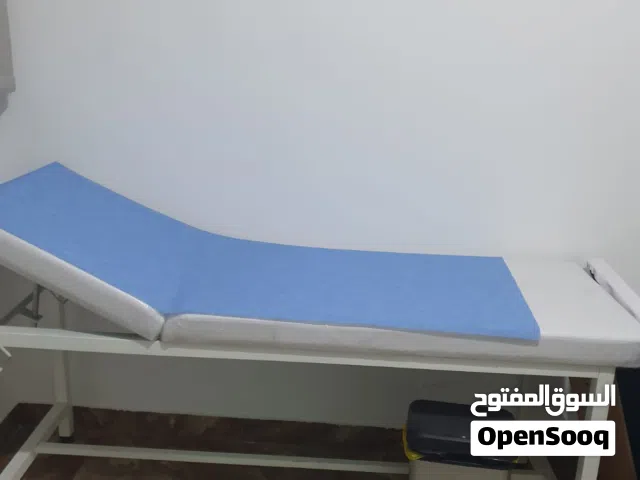 سرير كشف عيادة غير مستخدم