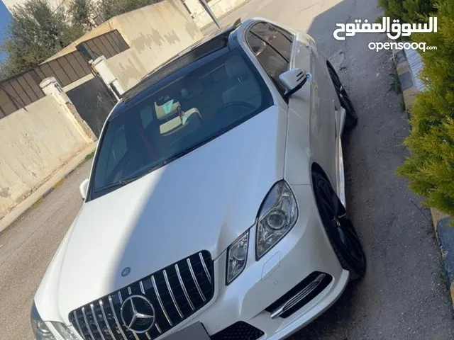 مرسيدس E200 لون ابيض لؤلؤي فل الفل بانوراما فحص 2 جيد بسعر مغري قابل للبدل