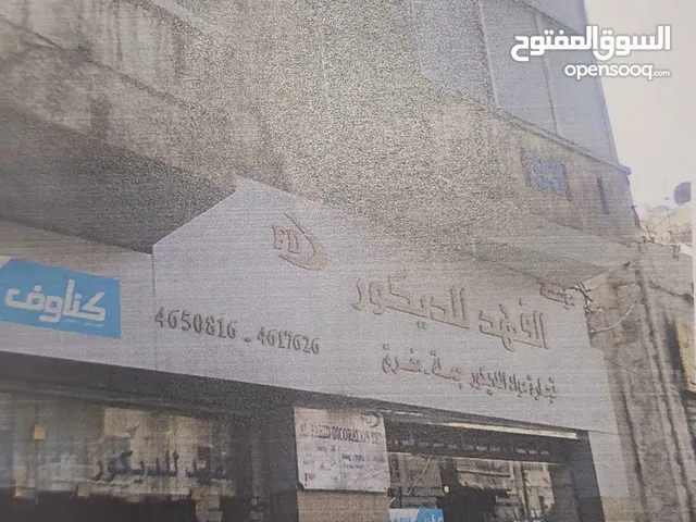 عمارة للايجار في وسط البلد شارع الامير محمد مقابل كازية وفا الدجاني