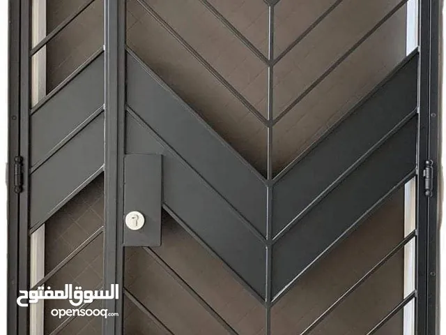 حداد هناجر وأبواب ليزر وأسوار ومظلات وقرميد وديكورات خشبية وبديل القرميد والصاج