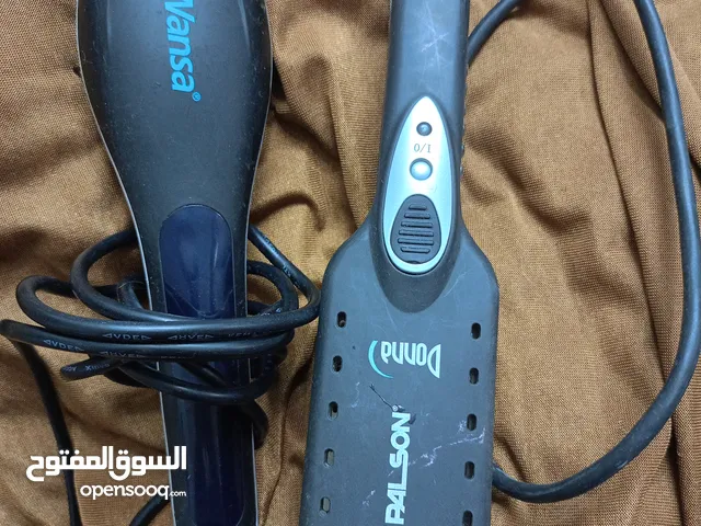 جهاز تصفيف وتمليس الشعر الحرارى