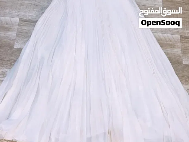 فستان أبيض إيطالي بسعر كزيوني