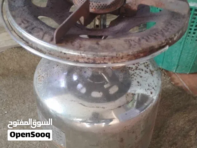 عدد مطبخ مستعمل وغاز سفري وماكينة حلاقة وصوبة كهربا