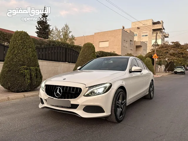 Mercedes Benz C350e فحص كامل بحالة ممتازة موديل 2016