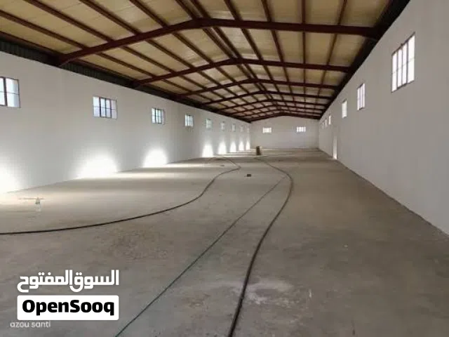 قطعة أرض مقام عليها هنجر في طريق المشتل ربي يبارك