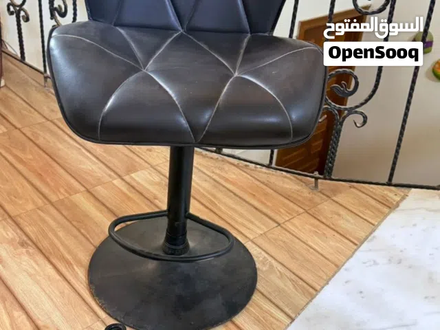 كرسي جلد دوار