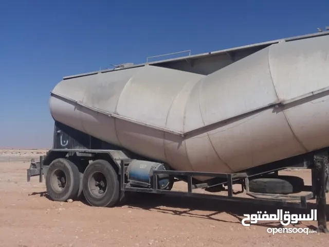 خزان اسمنت  سعه 55طن.   محورين