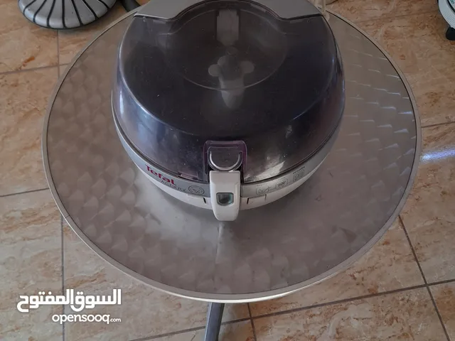 طاوله ستالس مع قلايه كهرباء