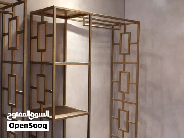 ستندات حديد لون ذهبي