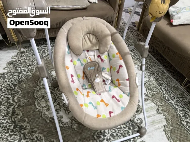 كرسي وارجوحة أطفال كهربائي ويدوي