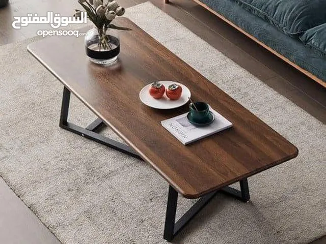 طاولات وسط بتصميم راقي وعصري طاولة بتخطف الأنظار! سطح أنيق بخامات عالية الجودة وقاعدة حديد قوية