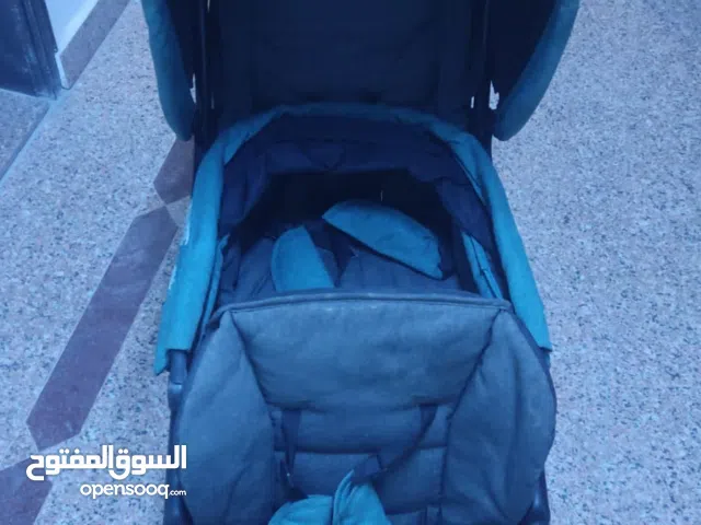 عربة اطفال مزدوجة