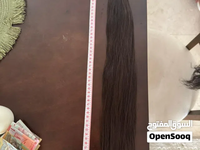 “شعر طبيعي 100٪ ناعم وكثيف، نظيف جداً وحالته ممتازة. مناسب للوصلات والتجمیل