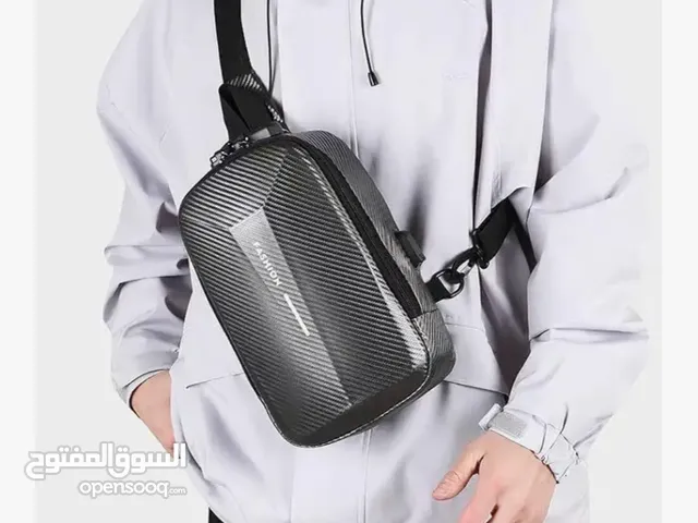 HARDSHELL DESIGN,ADJUSTABLE FIT,COMPACT SIZE: Mini backpack .