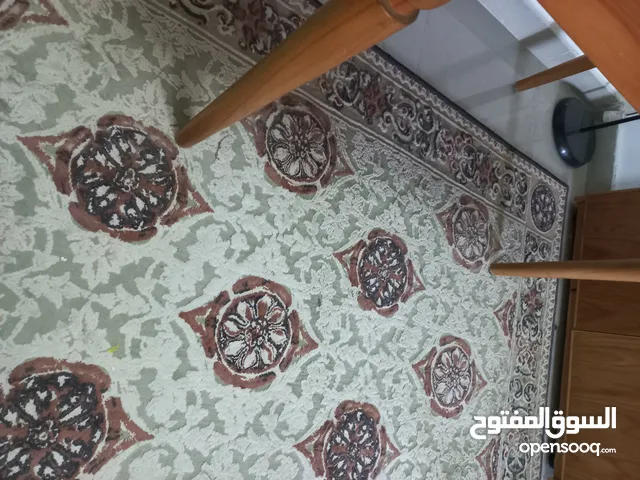 سجادة النساجون حرف ليزر