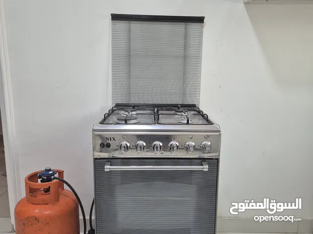 Gas oven with stove top.