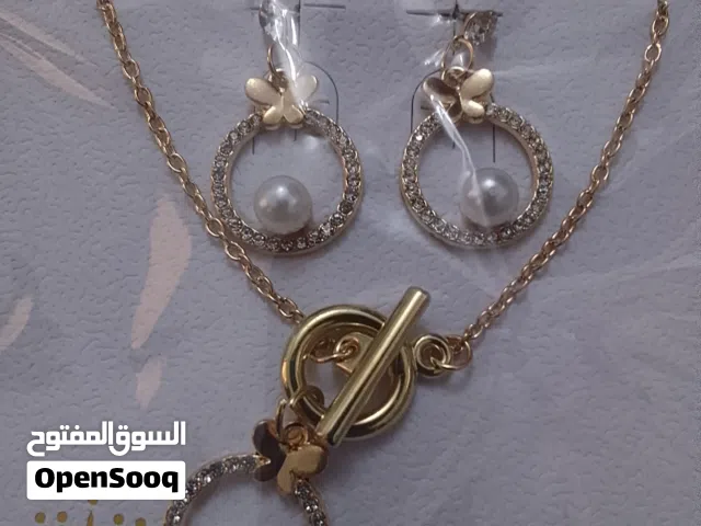 تعليقات ذهبي وفضي كاملة بحديده وخاتم  ومن غير حديدة