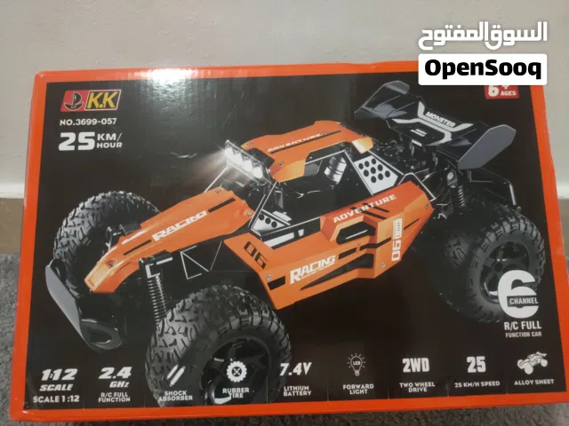 سياره ريموت كنترول لون برتقالي حجم 1.12 كبيره و سريعه جدا مستعمله ايام و بسعر مغري