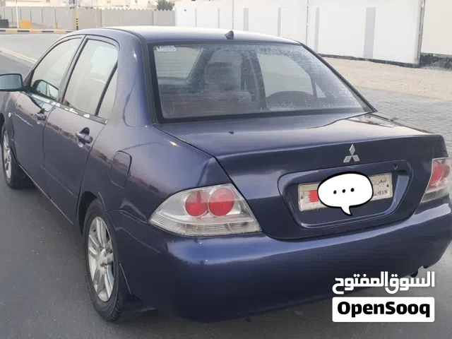 Mitsubishi Lancer model 2011 well maintained 1.6L  With Alloyrims Tubeless tyres CD player USB all.