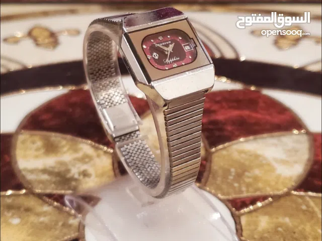 عرض خاص : ساعه ذهب ابيض مع ثلاثه افصاص الماس وحزام من الاستيل