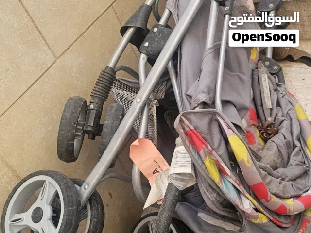 سكوتر مع شاحن  وعربانة اطفال للبيع