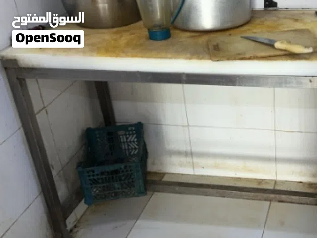 طاولة تقطيع لحوم واسماك ودواجن