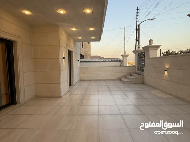 شقة طابق ارضي مع ترس سوبر ديلوكس بأجمل مناطق تلاع العلي  مساحة داخلية 227 متر ومساحة ترس 60 متر