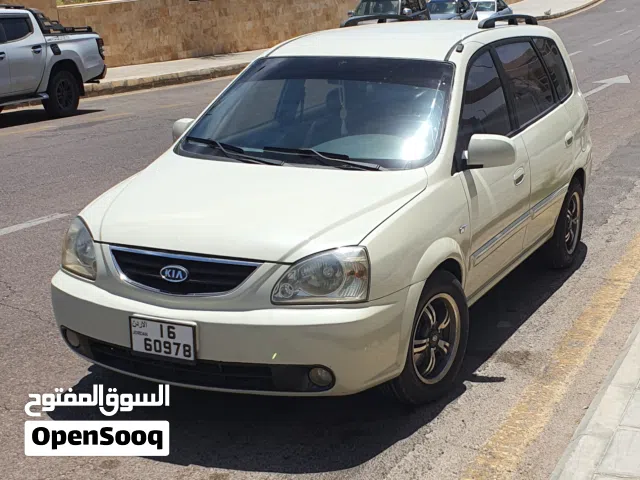 2003 كيا كارينز Standard
