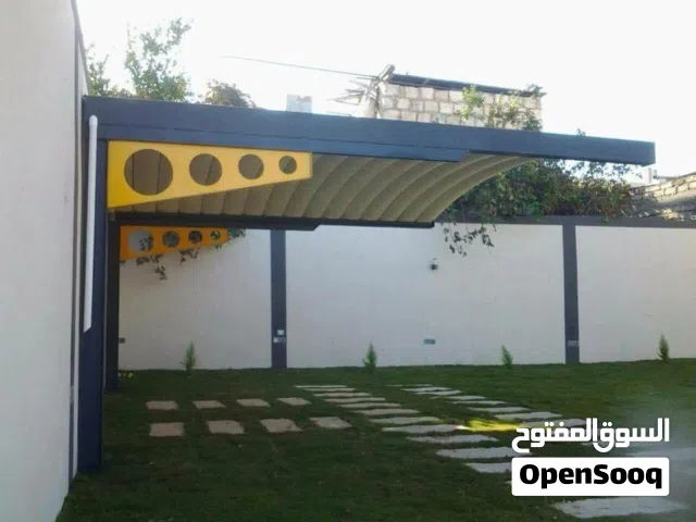 ورشة حدادة و مظلات و سياج