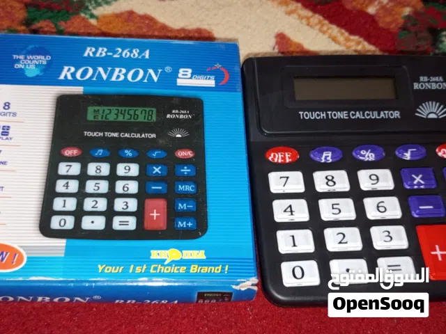 تُظهر الصورة آلة حاسبة صغيرة من نوع RONBON RB-268A مع علبتها الأصلية.