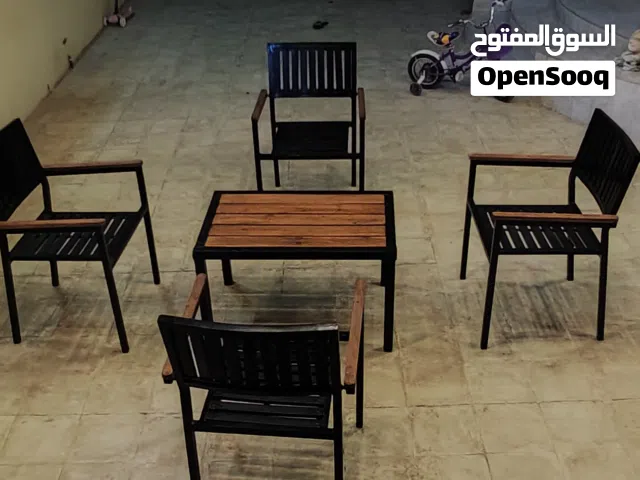 كراسي خارجي من الخشب والحديد