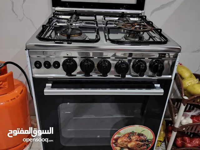 فرن غاز تكنوجاز 55*55 استيل 4 شعلات مستعمل يعمل بحالة ممتازة ونظيف مع جرة غاز مع منظم مانع التسرب