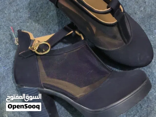 Black With Heels in Amman