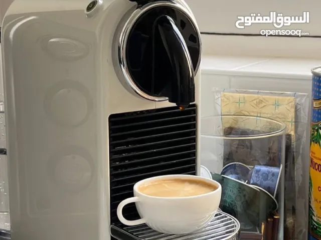 ماكينة كبسولات من شركة نسبرسو فخامة ومرتبة عالية الجودة