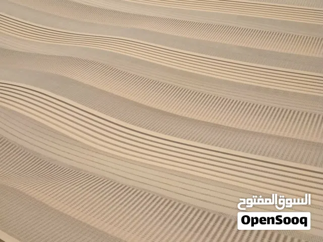 برداية زيبرا تفصيل بلون البيج المميز