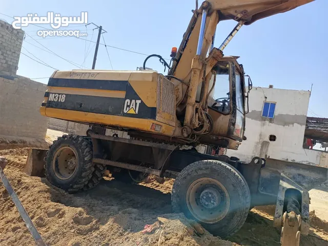 بوكلين كتر بلر 318 مع الدقاق للبيع او البدل بقلاب