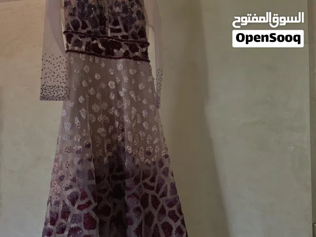 Custom tailored beaded gown