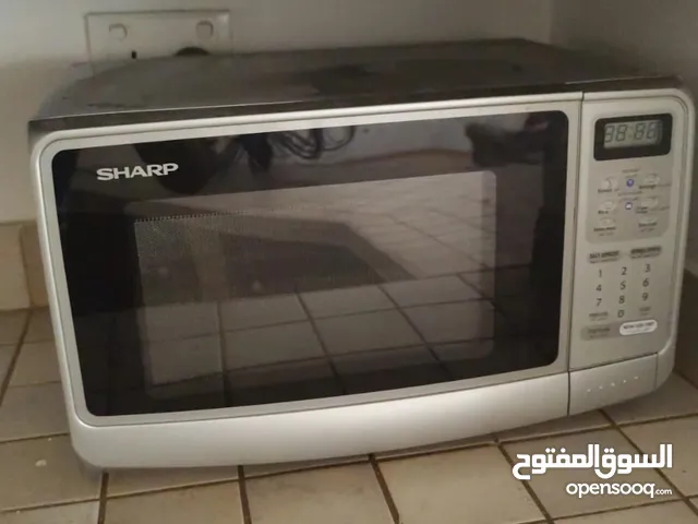 ميكرويف شارب بحاله ممتازه لتواصل وتسا Sharp microwave in excellent condition. For contact and Whats